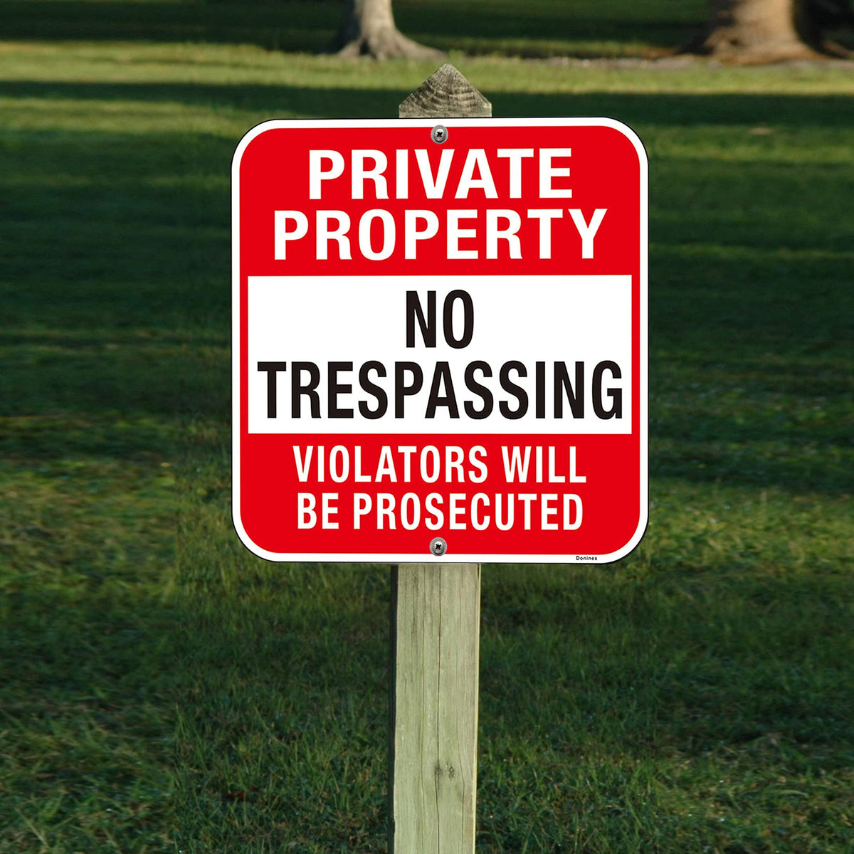 Doninex 4-pack private-property no-trespassing signs support multi-property protection outdoors.