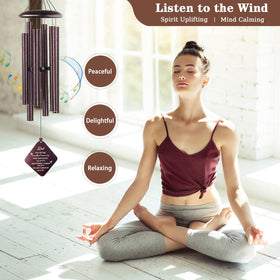Doopeer wind chimes hanging on a porch provide soothing sound for remembrance.