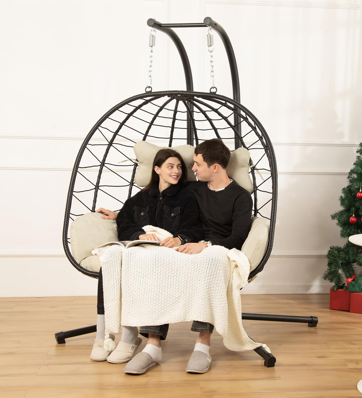DoubleTT double egg chair with stand, stand-assembly view, ideal for relaxed outdoor lounging.