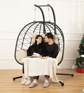 DoubleTT double egg chair with stand, stand-assembly view, ideal for relaxed outdoor lounging.