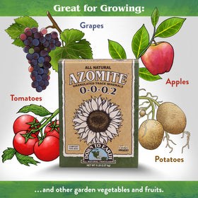 Down To Earth Azomite granules spread on soil in a garden bed