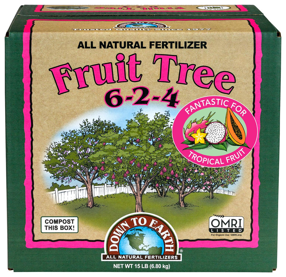 Down To Earth fruit tree fertilizer bottle shows balanced 6-2-4 formula for steady growth.
