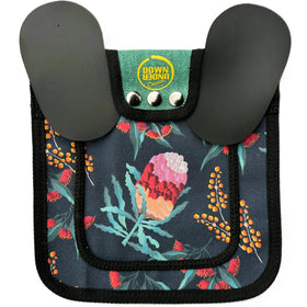 Adjustable straps with copper snaps secure a comfortable fit for medium to large breeds.