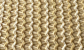 DOWN UNDER OUTDOORS sand-mesh shade cloth provides summer airflow and shading.