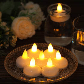 DragonflyDreams floating tealights in vase glow softly for romantic table décor.