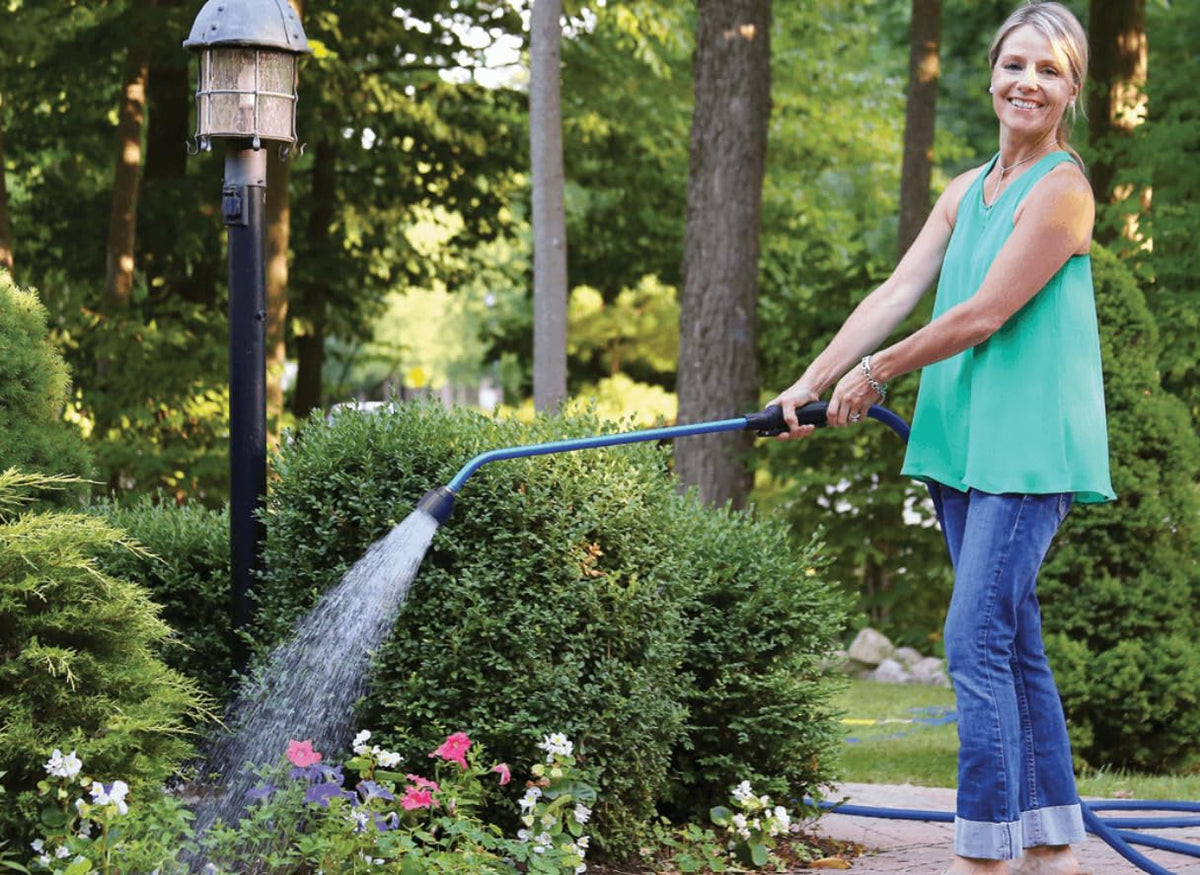 Dramm Touch-N-Flow Rain Wand 30-inch red extends reach for hanging baskets.