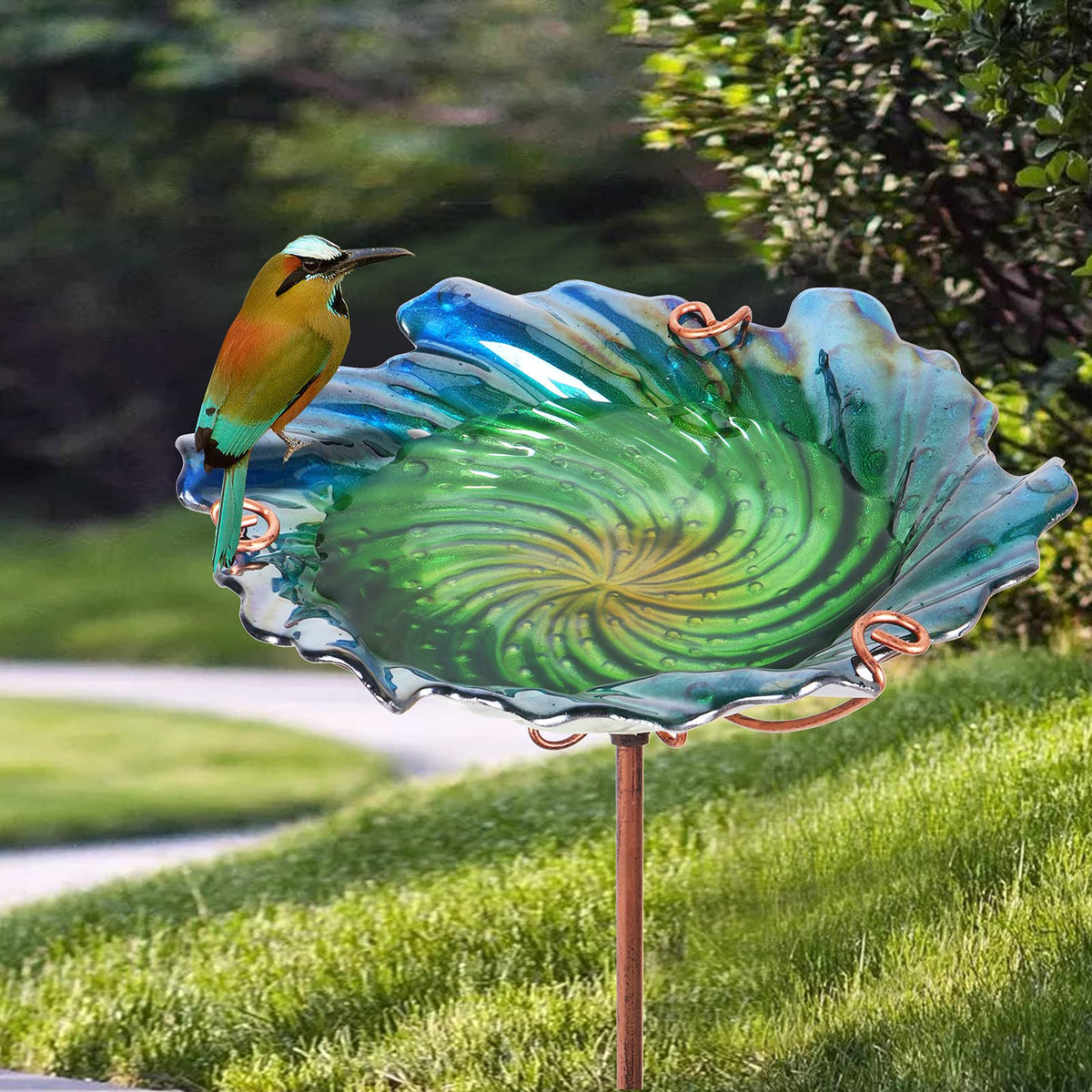 Dream Garden glass bird bath holds water for birds to drink and bathe