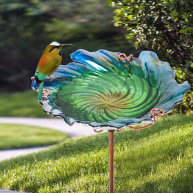 Dream Garden glass bird bath holds water for birds to drink and bathe