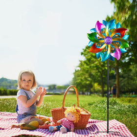 DREAMYSOUL yard art wind spinner adds decorative appeal to outdoor spaces.