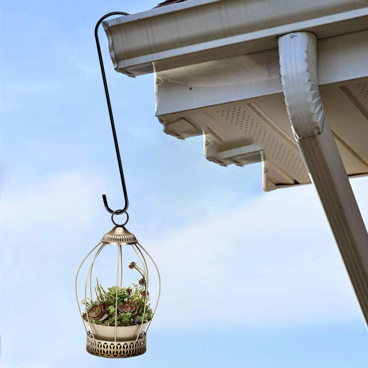 Dreecy basket hanging hook on a branch demonstrates easy placement.