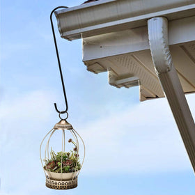 Dreecy basket hanging hook on a branch demonstrates easy placement.
