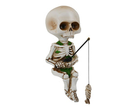 DS. DISTINCTIVE STYLE fishing-skeleton-statue perched by a pond for quirky outdoor charm