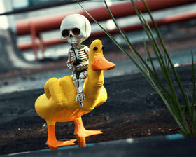 DS. DISTINCTIVE STYLE fishing-skeleton statue as a poolside ornament