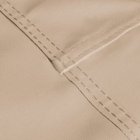 Duck Covers Elegant Waterproof Patio Sofa Cover showing nylon straps with side-release buckles securing the cover