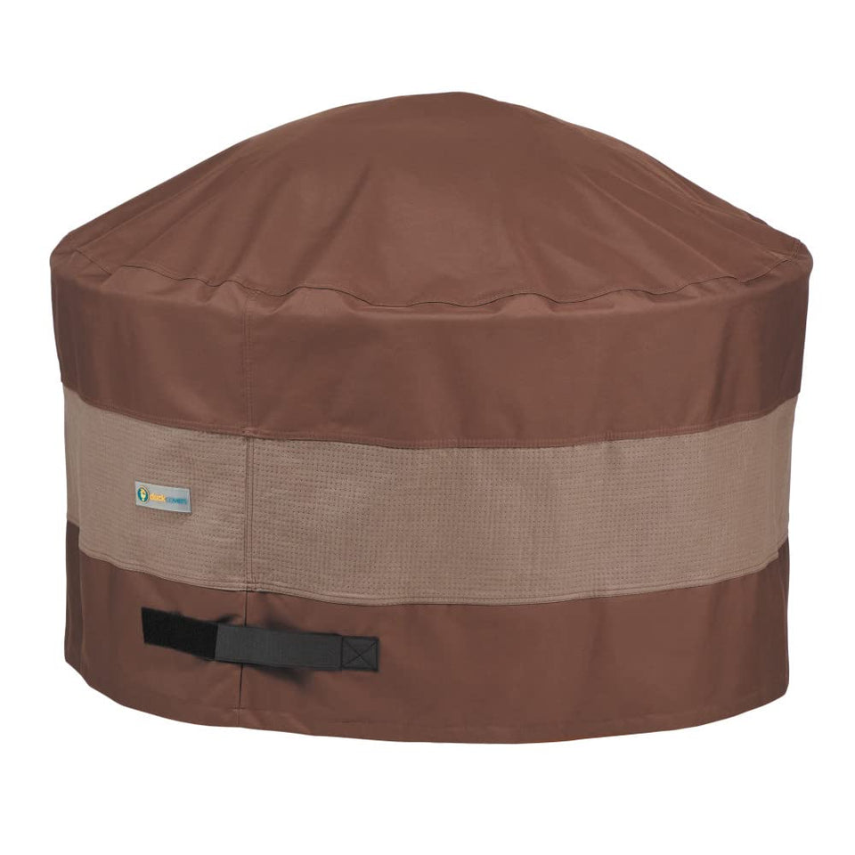 Duck Covers Ultimate Fire Pit Round Cover protecting a 34-inch pit from rain and dust.