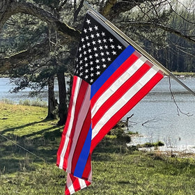 Ducuh flag features bright blue color symbolizing loyalty and bravery