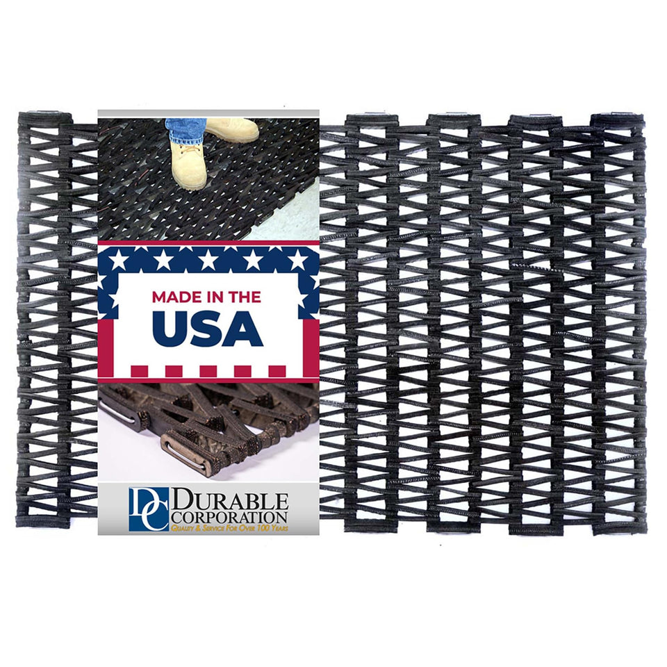 Durite outdoor entrance mat with herringbone weave for debris and water management.