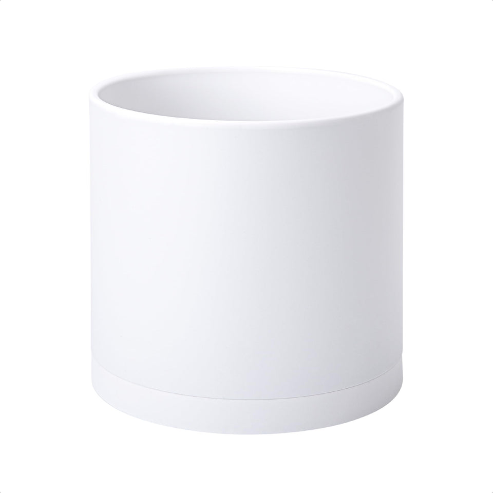 D'vine Dev 10-inch planter with drainage hole for balanced moisture.