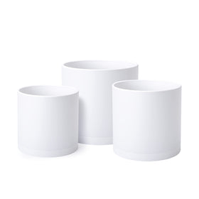 D'vine Dev 6 inch planter with drainage hole, ideal for small herbs.