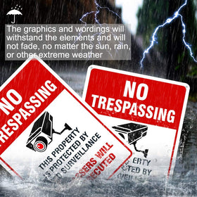 Dxyizus signs trespassers will be prosecuted sign clearly marks property boundary.