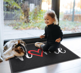 EARTHALL door mat with non-slip backing for stable placement.