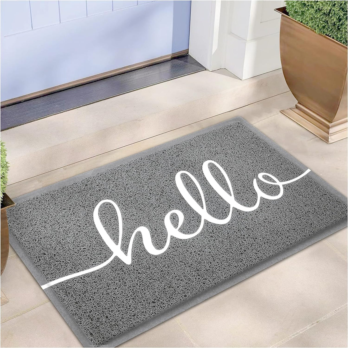 Earthall Hello doormat at front door traps dirt for a cleaner entry.