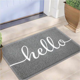 Earthall Hello doormat at front door traps dirt for a cleaner entry.