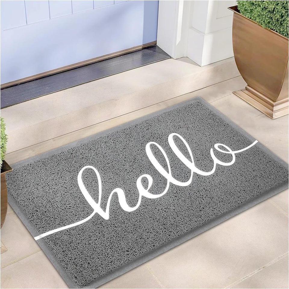 Earthall Hello doormat at front door traps dirt for a cleaner entry.