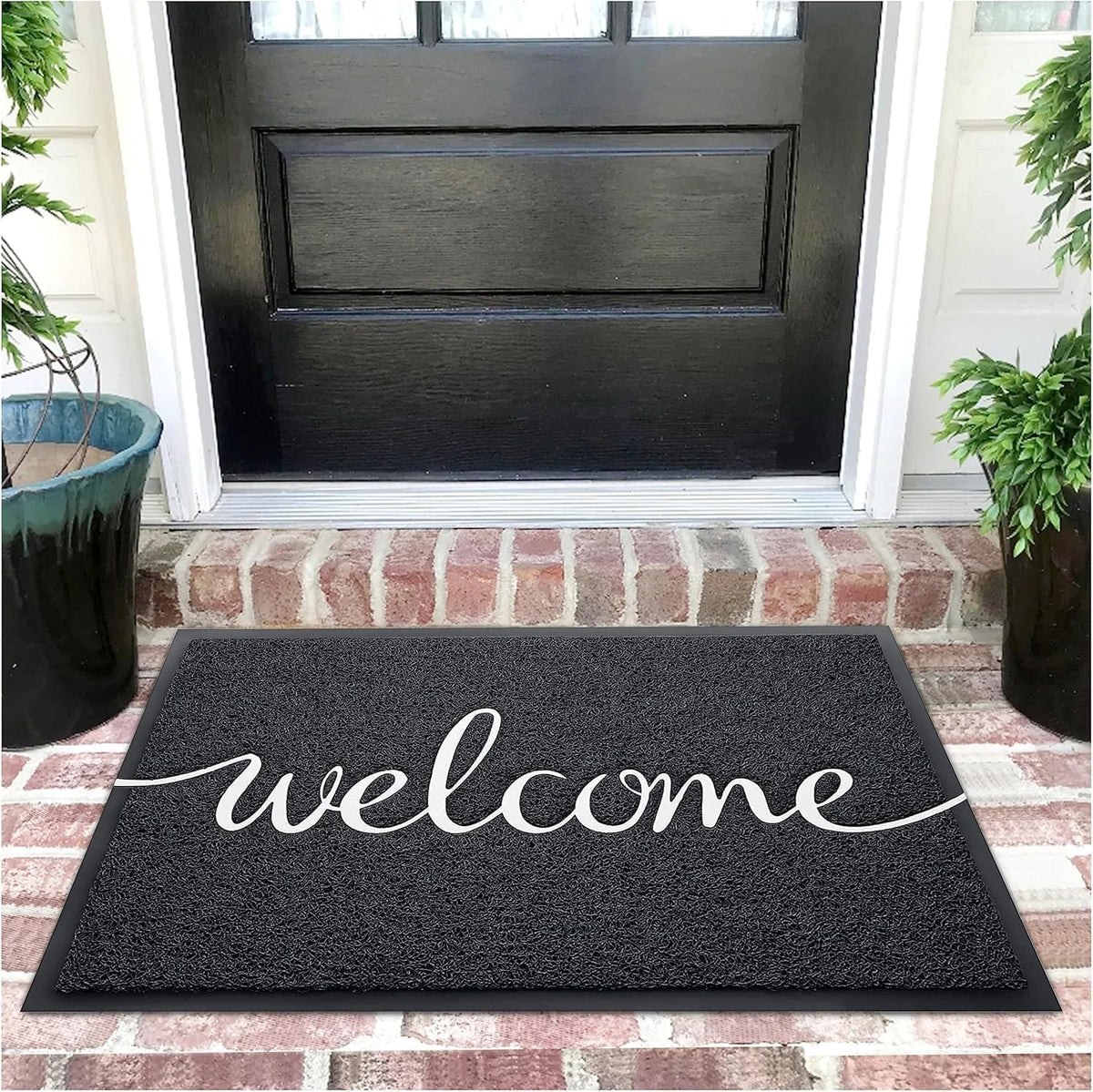 Earthall welcome mat at the front door traps dirt and keeps entry tidy