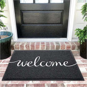 Earthall welcome mat at the front door traps dirt and keeps entry tidy