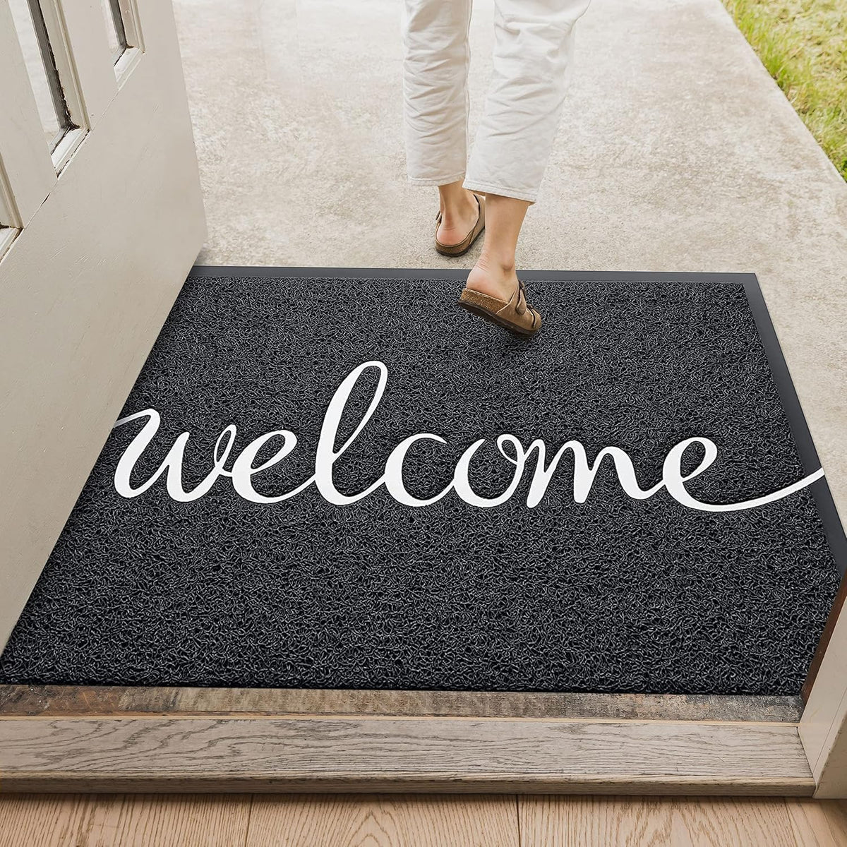Earthall zero-point-four-inch doormat fits under most doors without catching.