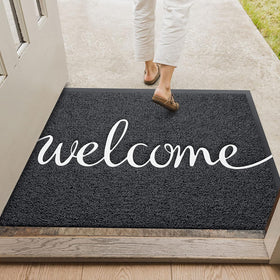 Earthall zero-point-four-inch doormat fits under most doors without catching.