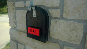 Earthtec mailbox flag front mount enhances visibility on brick or stone homes.