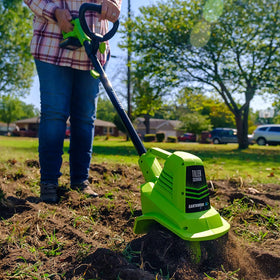 Earthwise TC70020IT battery and charger powering cordless gardening sessions