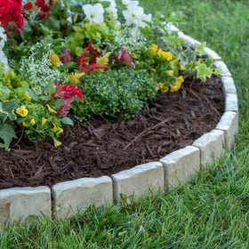 EasyFlex border installed over landscape fabric helps prevent weeds.