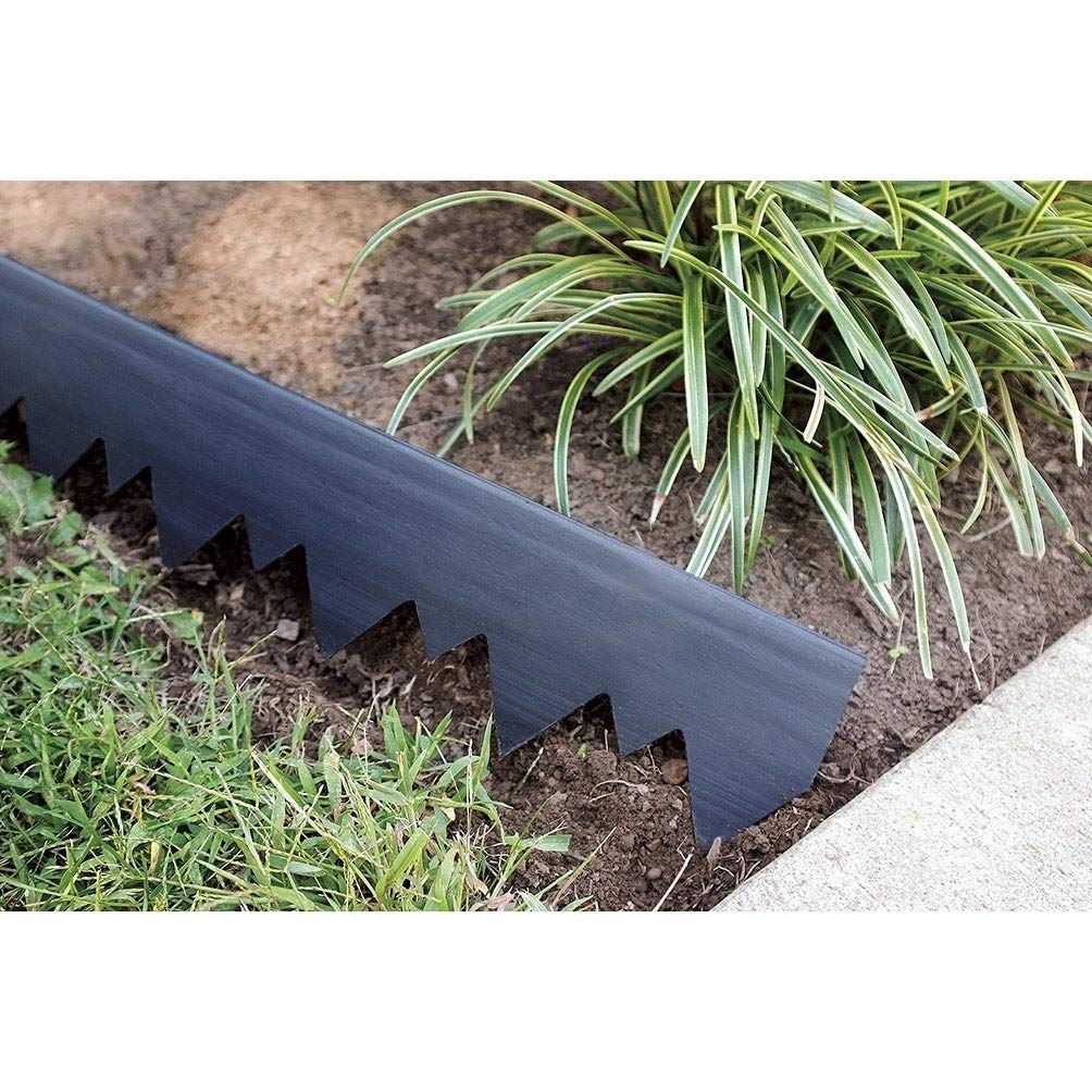 EasyFlex installation in rocky soil with a hammer demonstrates quick edging setup.