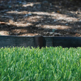 Edging installed along curved garden border with EasyFlex