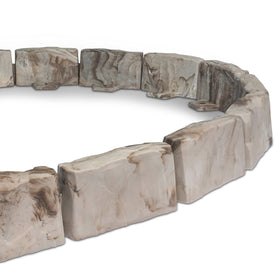 EasyFlex tree-ring edging demonstrates flexible, durable border around a tree.