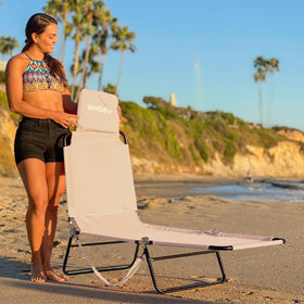 EasyGo Products pool chair on beach scene for vacation lounging.