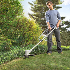 Ecmln Weed Eater Handle yard trimming scene shows improved control and edging ease.