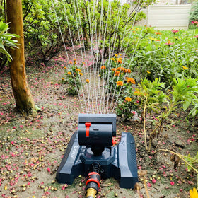 Eden mini turbo sprinkler showing 4-way adjustable controls for precise watering.