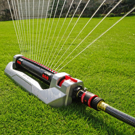 Durable aluminum base of Eden Turbo Oscillating Sprinkler outdoors