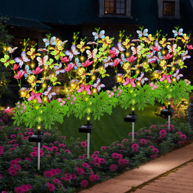 EDOF Solar Butterfly Lights ground installation showing wire-free setup for garden beds