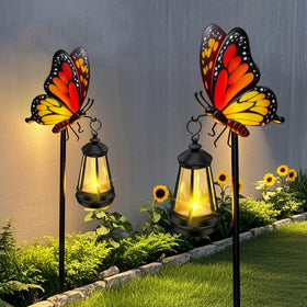 EDOF solar powered butterfly light illuminates pathways with warm glow.