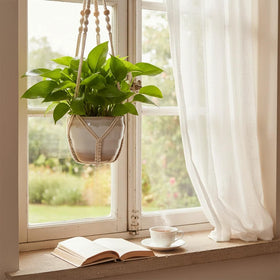 Indoor-outdoor compatible EJGIEGSO plant hanger for flexible use.
