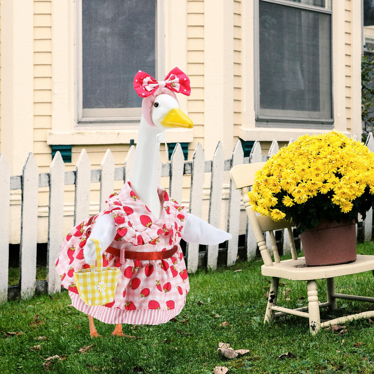 Easy setup EKOREST goose outfit shown ready to wear on lawn statue