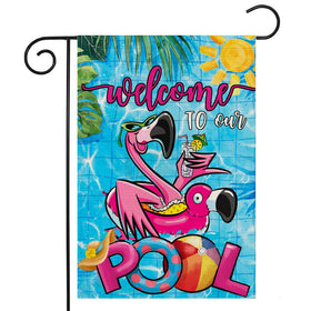 EKOREST flamingo welcome pool flag greets guests at the outdoor pool.
