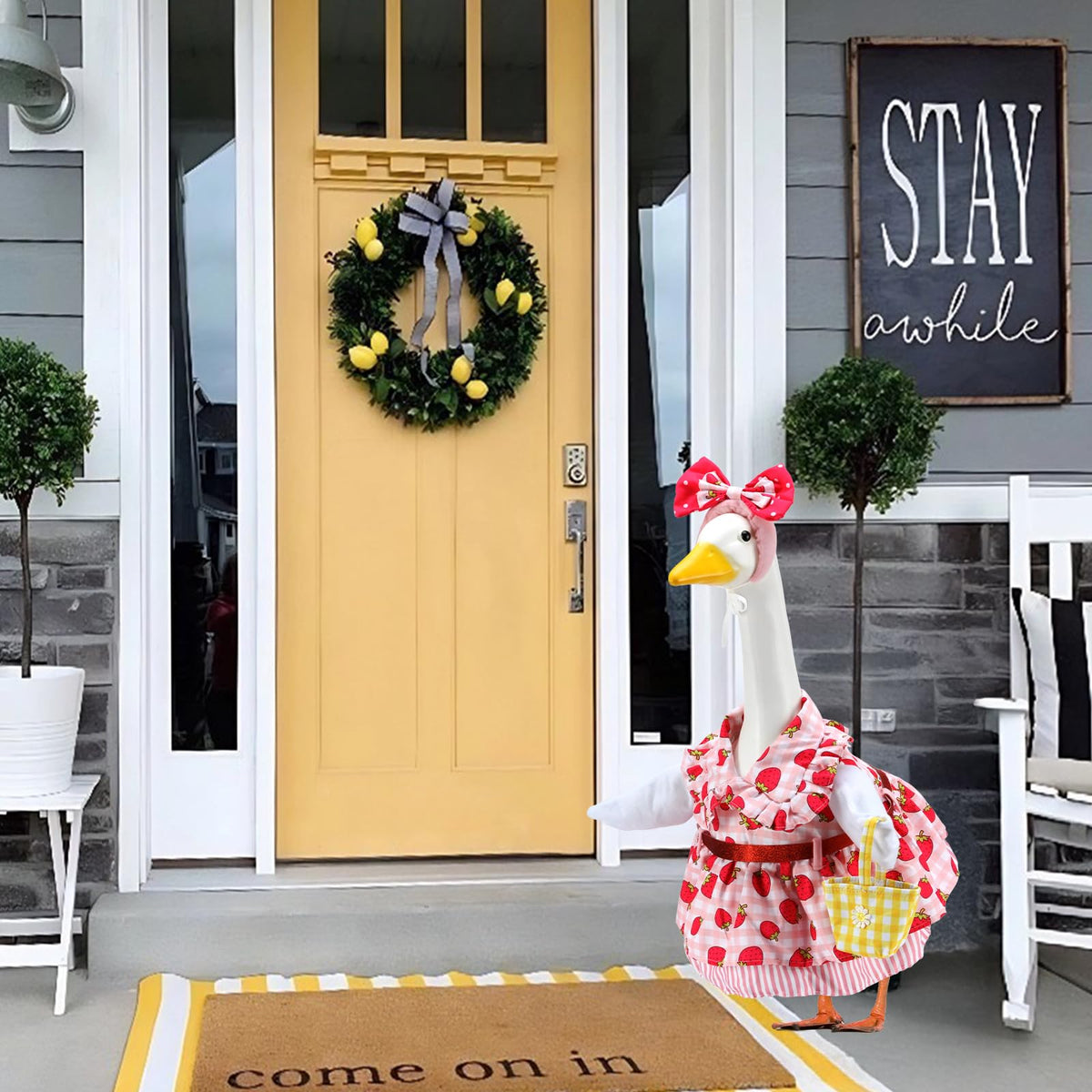 Outdoor yard decor with EKOREST goose ensemble near garden path