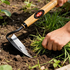 Elegital Kana Hoe 217 garden tool clears vines and trims roots with ease.