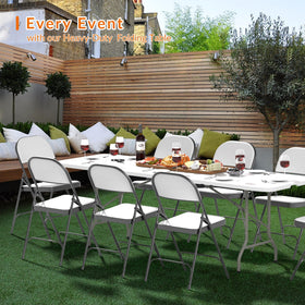 Elevon outdoor dining table in use at backyard gathering.